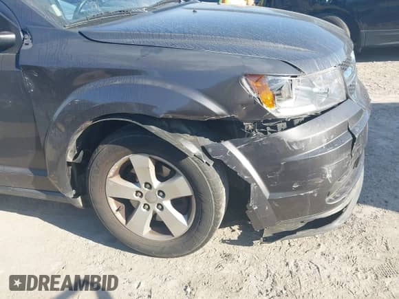 2014 Dodge Journey SE with VIN 3C4PDDAG5ET279249, listed as a IAAI auction lot 43113809 with 205,829 mi miles and . Bid and sale history available at DreamBid. Image 6.