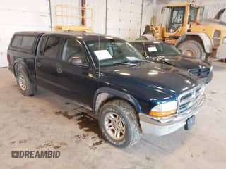 2003 Dodge Dakota SLT with VIN 1D7HL48N63S177233, listed as a IAAI auction lot 42167711 with 163,511 mi miles and . Bid and sale history available at DreamBid. Image 1.