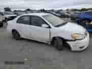 2004 Toyota Corolla S with VIN 1NXBR32E04Z321362, listed as a Copart auction lot 84808715 with 177,499 mi miles and Salvage title. Bid and sale history available at DreamBid. Image 4.