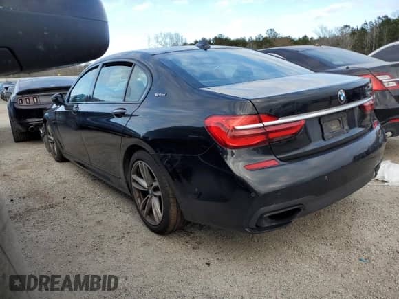 2017 BMW 7 Series 740e xDrive with VIN WBA7J2C33HG497977, listed as a Copart auction lot 37351114 with Not provided miles and . Bid and sale history available at DreamBid. Image 2.
