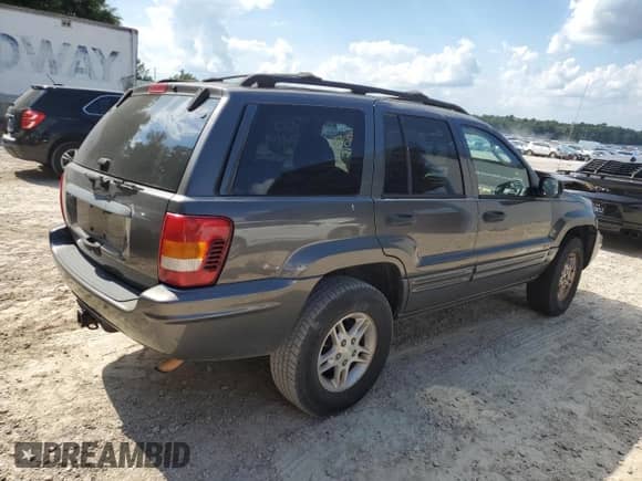 2002 Jeep Grand Cherokee с VIN 1J8GX48S12C255290, выставлен на аукционе Copart как лот 57832025 с пробегом 191 293 миль миль и На запчасти • Non repairable. История ставок и продаж доступна на DreamBid. Изображение 3.