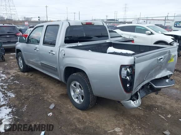 2010 Chevrolet Colorado 1LT z VIN 1GCDSCDE0A8125747, wystawiony jako IAAI lot #41634604 z przebiegiem 120 215 mil mil oraz . Historia ofert i sprzedaży dostępna na DreamBid. Obrazek 3.
