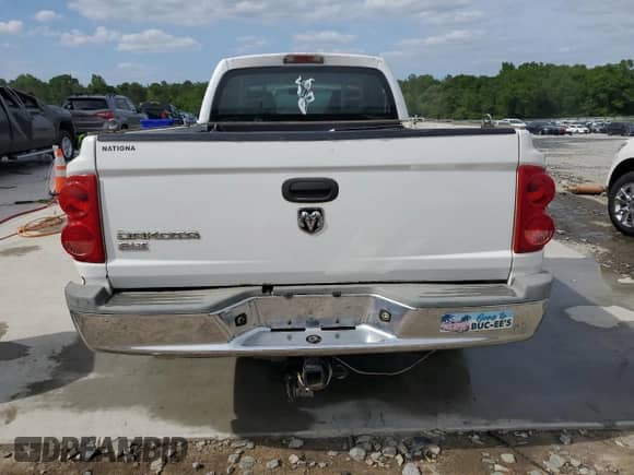 2006 Dodge Dakota SLT с VIN 1D7HE42KX6S646479, выставлен на аукционе Copart как лот 53578495 с пробегом 254 683 миль миль и Списание • Salvage title. История ставок и продаж доступна на DreamBid. Изображение 6.
