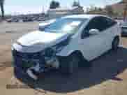 2022 Toyota Prius Limited with VIN JTDKAMFP7N3201286, listed as a IAAI auction lot 43282629 with 31,664 mi miles and . Bid and sale history available at DreamBid. Image 2.