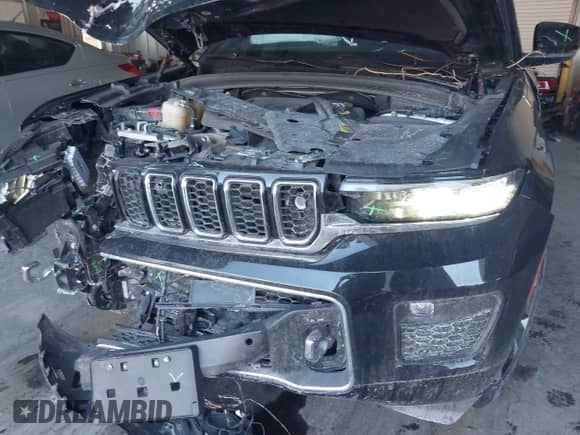 2023 Jeep Grand Cherokee Overland z VIN 1C4RJHDG5PC507978, wystawiony jako IAAI lot #41394199 z przebiegiem 57 323 mil mil oraz . Historia ofert i sprzedaży dostępna na DreamBid. Obrazek 6.