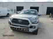 2017 Toyota Tacoma SR5 с VIN 5TFAX5GN4HX095311, выставлен на аукционе Copart как лот 82027495 с пробегом 126 042 миль миль и Списание • Salvage title. История ставок и продаж доступна на DreamBid. Изображение 13.