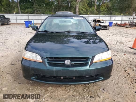 1999 Honda Accord EX with VIN 1HGCG1651XA064572, listed as a Copart auction lot 85878025 with 312,538 mi miles and Salvage title. Bid and sale history available at DreamBid. Image 5.