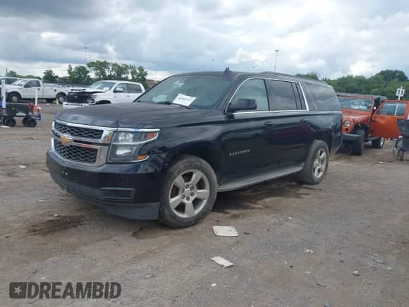 2015 Chevrolet Suburban LT with VIN 1GNSCJKC1FR545648, listed as a IAAI auction lot 42982512 with 405,947 mi miles and . Bid and sale history available at DreamBid. Image 2.
