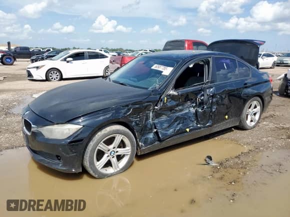 2014 BMW 3 Series 320i with VIN WBA3B1C59EK134700, listed as a Copart auction lot 60987785 with 149,684 mi miles and Salvage title. Bid and sale history available at DreamBid. Image 1.
