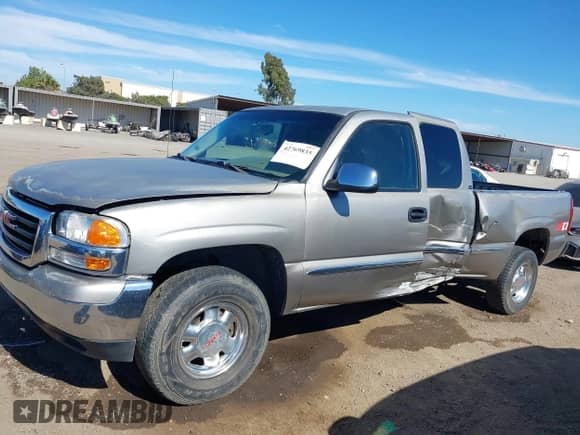 2002 GMC Sierra 1500 SLE z VIN 2GTEK19T121357441, wystawiony jako IAAI lot #42769835 z przebiegiem 214 966 mil mil oraz . Historia ofert i sprzedaży dostępna na DreamBid. Obrazek 6.