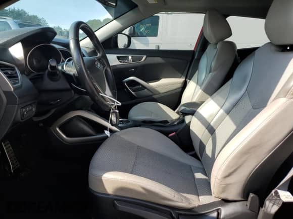 2013 Hyundai Veloster w/Black Int z VIN KMHTC6AD5DU088630, wystawiony jako Copart lot #80093115 z przebiegiem 76 327 mil mil oraz Szkoda całkowita • Salvage title. Historia ofert i sprzedaży dostępna na DreamBid. Obrazek 7.