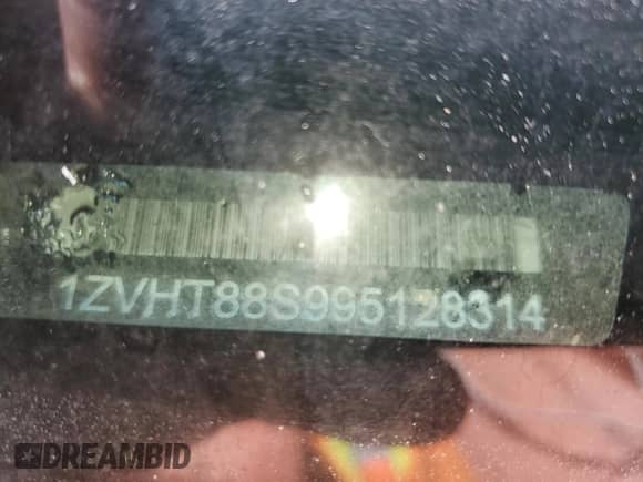 2009 Ford Mustang Shelby GT500 z VIN 1ZVHT88S995128314, wystawiony jako Copart lot #68973314 z przebiegiem 74 339 mil mil oraz Szkoda całkowita • Salvage title. Historia ofert i sprzedaży dostępna na DreamBid. Obrazek 13.