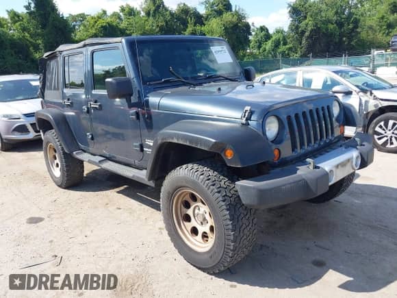 2008 Jeep Wrangler Unlimited Sahara with VIN 1J4GA59128L607591, listed as a IAAI auction lot 42959722 with 129,564 mi miles and . Bid and sale history available at DreamBid. Image 1.