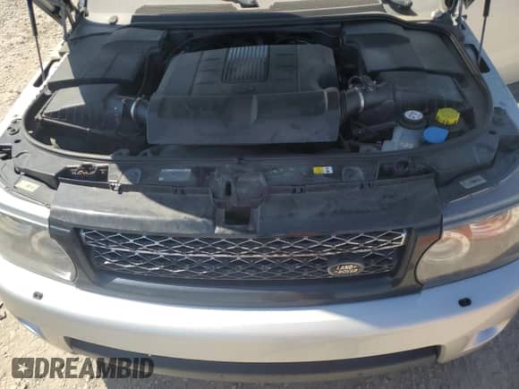 2012 Land Rover Range Rover Sport HSE Lux with VIN SALSK2D46CA753440, listed as a Copart auction lot 70931095 with 169,290 mi miles and Salvage title. Bid and sale history available at DreamBid. Image 12.