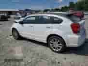 2011 Dodge Caliber Heat with VIN 1B3CB5HA9BD214435, listed as a Copart auction lot 64458005 with 138,749 mi miles and Salvage title. Bid and sale history available at DreamBid. Image 2.