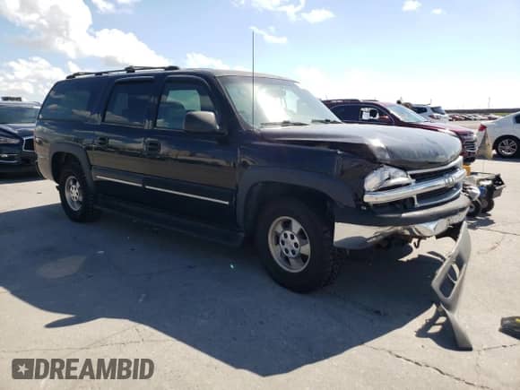 2001 Chevrolet Suburban LS z VIN 3GNEC16T01G227827, wystawiony jako Copart lot #72776434 z przebiegiem Nie podano mil oraz Szkoda całkowita • Salvage title. Historia ofert i sprzedaży dostępna na DreamBid. Obrazek 4.