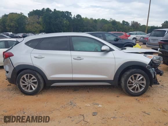 2017 Hyundai Tucson SE z VIN KM8J33A44HU400464, wystawiony jako IAAI lot #43404828 z przebiegiem 155 489 mil mil oraz . Historia ofert i sprzedaży dostępna na DreamBid. Obrazek 12.