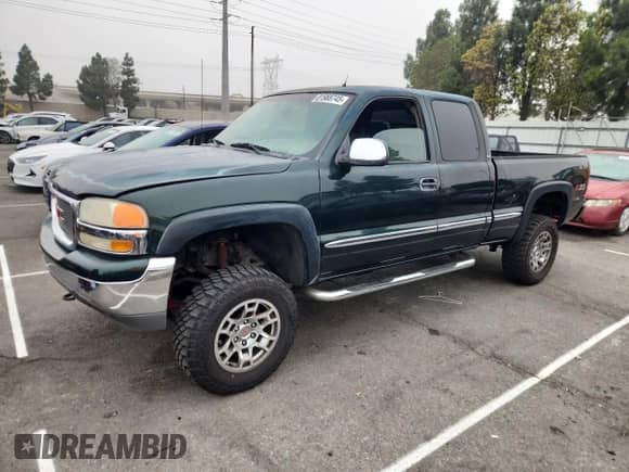 2001 GMC Sierra 1500 SLE с VIN 1GTEK19T61E156793, выставлен на аукционе Copart как лот 81988745 с пробегом Не указан миль и Списание • Salvage title. История ставок и продаж доступна на DreamBid. Изображение 1.