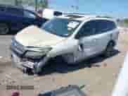 2021 Honda Pilot Touring 7-Passenger z VIN 5FNYF5H62MB011807, wystawiony jako IAAI lot #43367010 z przebiegiem Nie podano mil oraz . Historia ofert i sprzedaży dostępna na DreamBid. Obrazek 2.