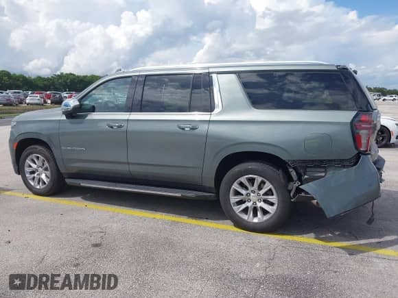 2023 Chevrolet Suburban Premier with VIN 1GNSCFKD6PR322447, listed as a IAAI auction lot 43298527 with 78,319 mi miles and . Bid and sale history available at DreamBid. Image 14.