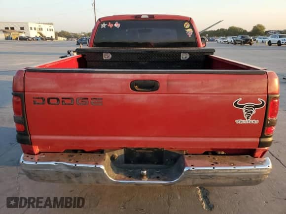 2000 Dodge 1500 z VIN 3B7HC12Y8YG120199, wystawiony jako Copart lot #74834464 z przebiegiem 218 439 mil mil oraz Szkoda całkowita • Salvage title. Historia ofert i sprzedaży dostępna na DreamBid. Obrazek 6.