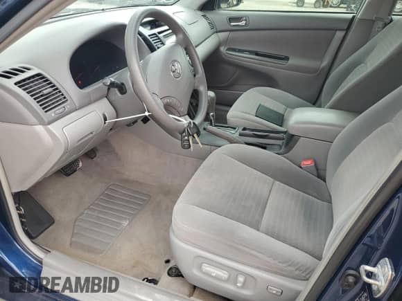 2005 Toyota Camry LE z VIN 4T1BE32K75U060475, wystawiony jako Copart lot #83996795 z przebiegiem Nie podano mil oraz Szkoda całkowita • Salvage title. Historia ofert i sprzedaży dostępna na DreamBid. Obrazek 7.