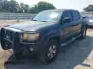 2010 Toyota Tacoma PreRunner with VIN 3TMJU4GN8AM101948, listed as a IAAI auction lot 42655977 with 228,965 mi miles and . Bid and sale history available at DreamBid. Image 2.