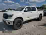 2010 Toyota Tundra с VIN 5TFDW5F12AX113311, выставлен на аукционе Copart как лот 71679675 с пробегом 147 388 миль миль и Чистый • Clean title. История ставок и продаж доступна на DreamBid. Изображение 1.