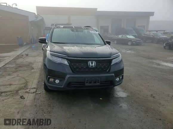 2021 Honda Passport Touring with VIN 5FNYF7H96MB011542, listed as a Copart auction lot 85740944 with 80,648 mi miles and Salvage title. Bid and sale history available at DreamBid. Image 11.