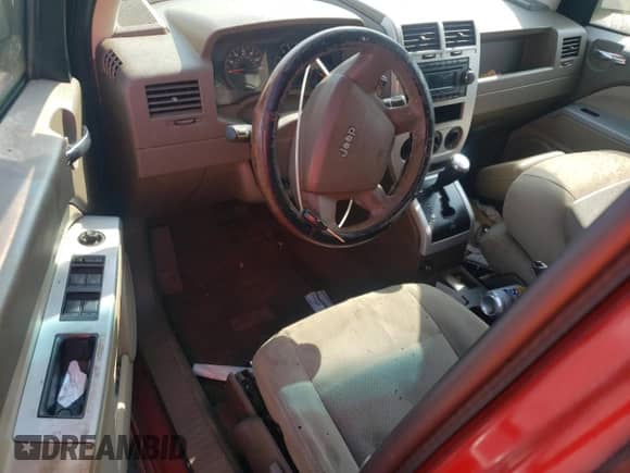 2008 Jeep Compass Sport с VIN 1J8FT47048D708781, выставлен на аукционе Copart как лот 63935625 с пробегом 191 007 миль миль и Чистый • Clean title. История ставок и продаж доступна на DreamBid. Изображение 8.