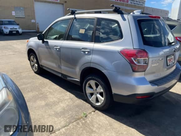 2016 Subaru Forester 2.5i with VIN JF2SJABC9GH553570, listed as a IAAI auction lot 43427311 with 173,021 mi miles and . Bid and sale history available at DreamBid. Image 3.