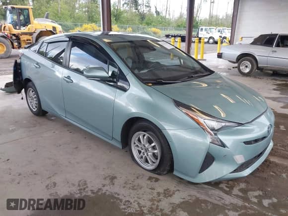 2016 Toyota Prius Four z VIN JTDKARFU9G3024875, wystawiony jako IAAI lot #42314235 z przebiegiem 101 383 mil mil oraz . Historia ofert i sprzedaży dostępna na DreamBid. Obrazek 1.