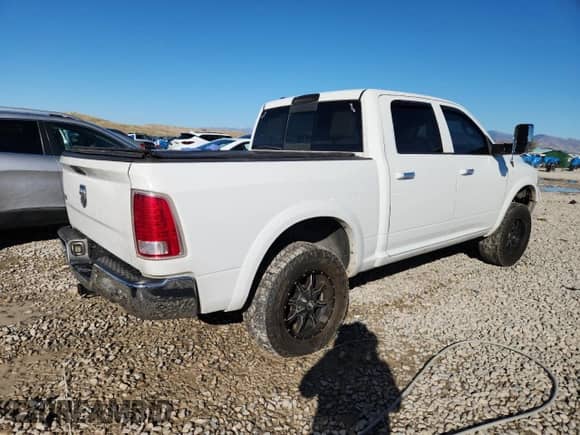 2014 Ram 1500 Laramie z VIN 1C6RR7NM3ES476697, wystawiony jako Copart lot #85137595 z przebiegiem 202 962 mil mil oraz Szkoda całkowita • Salvage title. Historia ofert i sprzedaży dostępna na DreamBid. Obrazek 3.