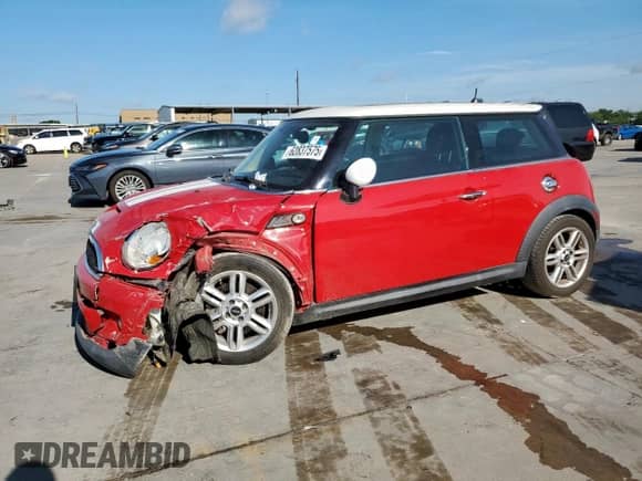 2012 MINI Hardtop S with VIN WMWSV3C50CTY25944, listed as a Copart auction lot 62837575 with 73,618 mi miles and Salvage title. Bid and sale history available at DreamBid. Image 1.