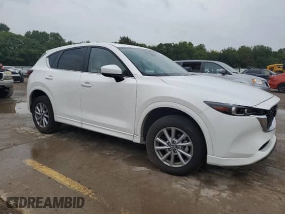 2024 Mazda CX-5 S Preferred z VIN JM3KFBCL6R0527540, wystawiony jako Copart lot #71773485 z przebiegiem 13 959 mil mil oraz Szkoda całkowita • Salvage title. Historia ofert i sprzedaży dostępna na DreamBid. Obrazek 4.
