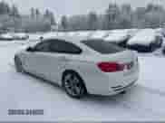 2016 BMW 4 Series 428i with VIN WBA4A9C53GG507015, listed as a IAAI auction lot 41649268 with 184,240 mi miles and . Bid and sale history available at DreamBid. Image 3.