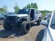 2021 Jeep Wrangler Unlimited Sahara High Altitude with VIN 1C4HJXENXMW670526, listed as a IAAI auction lot 42868629 with 26,407 mi miles and . Bid and sale history available at DreamBid. Image 18.