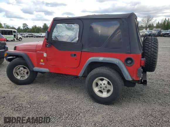 1998 Jeep Wrangler SE with VIN 1J4FY29P8WP767006, listed as a Copart auction lot 55603315 with 146,169 mi miles and Salvage title. Bid and sale history available at DreamBid. Image 2.