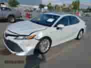 2020 Toyota Camry Hybrid XLE with VIN 4T1F31AK4LU523702, listed as a IAAI auction lot 42734831 with 144,778 mi miles and . Bid and sale history available at DreamBid. Image 17.