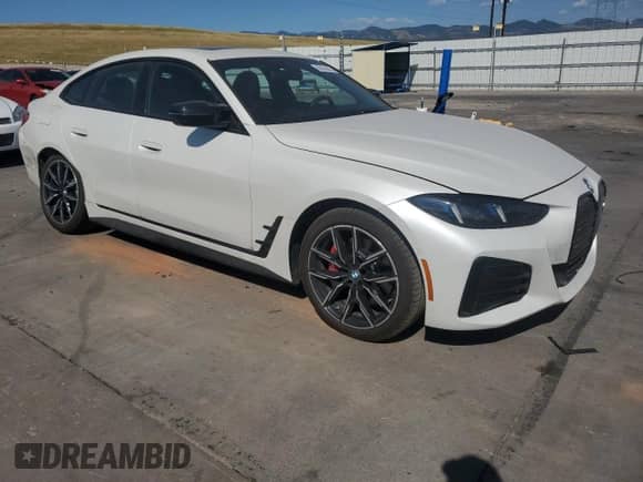 2025 BMW i4 M50 с VIN WBY33HD06SFU12371, выставлен на аукционе Copart как лот 63578455 с пробегом 4 884 миль миль и Списание • Salvage title. История ставок и продаж доступна на DreamBid. Изображение 4.