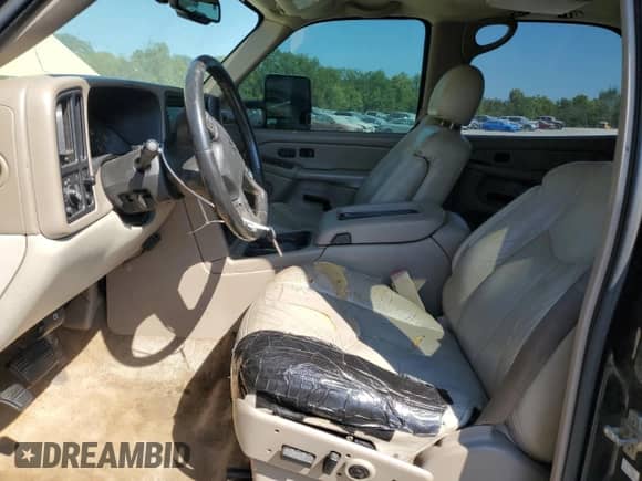 2004 Chevrolet Tahoe LT с VIN 1GNEC13Z34J313855, выставлен на аукционе Copart как лот 70642795 с пробегом 314 554 миль миль и Списание • Salvage title. История ставок и продаж доступна на DreamBid. Изображение 7.