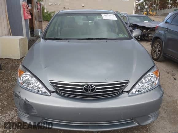 2005 Toyota Camry XLE z VIN 4T1BE32K05U593414, wystawiony jako IAAI lot #43512055 z przebiegiem 268 900 mil mil oraz . Historia ofert i sprzedaży dostępna na DreamBid. Obrazek 12.