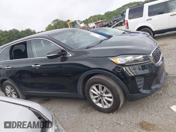 2020 Kia Sorento L with VIN 5XYPG4A37LG628761, listed as a IAAI auction lot 42959898 with 141,947 mi miles and . Bid and sale history available at DreamBid. Image 13.