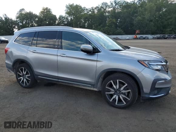 2021 Honda Pilot Touring 8-Passenger с VIN 5FNYF6H91MB014245, выставлен на аукционе Copart как лот 70459685 с пробегом 52 632 миль миль и Списание • Salvage title. История ставок и продаж доступна на DreamBid. Изображение 4.