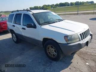 2004 Jeep Grand Cherokee Laredo z VIN 1J4GW48S44C182620, wystawiony jako IAAI lot #43204641 z przebiegiem 298 093 mil mil oraz . Historia ofert i sprzedaży dostępna na DreamBid. Obrazek 1.