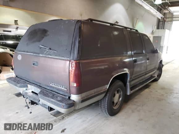 1997 Chevrolet Suburban с VIN 1GNEC16R1VJ352537, выставлен на аукционе Copart как лот 74200024 с пробегом Не указан миль и На запчасти • Non repairable. История ставок и продаж доступна на DreamBid. Изображение 3.