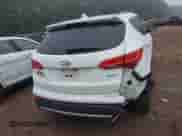 2014 Hyundai Santa Fe с VIN 5XYZU3LB1EG135810, выставлен на аукционе IAAI как лот 43312775 с пробегом 99 730 миль миль и . История ставок и продаж доступна на DreamBid. Изображение 6.