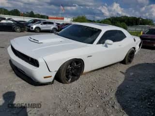 2013 Dodge Challenger R/T Classic с VIN 2C3CDYBT3DH619169, выставлен на аукционе Copart как лот 59517235 с пробегом 143 896 миль миль и Списание • Salvage title. История ставок и продаж доступна на DreamBid. Изображение 1.