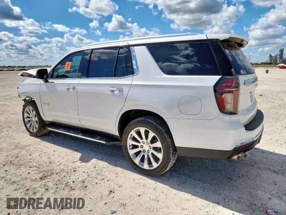 2023 Chevrolet Tahoe Premier with VIN 1GNSCSKD2PR262160, listed as a Copart auction lot 81327285 with 25,164 mi miles and Salvage title. Bid and sale history available at DreamBid. Image 2.