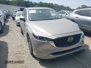 2025 Mazda CX-5 S Preferred z VIN JM3KFBCLXS0643880, wystawiony jako IAAI lot #43089450 z przebiegiem 8 356 mil mil oraz . Historia ofert i sprzedaży dostępna na DreamBid. Obrazek 1.